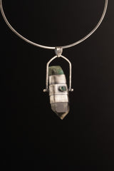 Large spinner pendant shown on a dark background with Australian Emerald side, black cotton cord, and oxidized sterling silver bezel.
