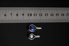 Pearlescent Spinner Elegance Pendant: Pearl - Sterling Silver Pendant