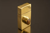 Ethiopian Opal brass keepsake box shown upright with polished cast brass body and gemstone lid detail.
