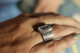 Vera Cruz Twilight Amethyst adjustable ring in oxidized 925 sterling silver shown worn on the hand with brushed texture.