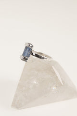 Side view of Australian Kyanite ring showing the raised deep blue stone, hammered sterling silver band, and handmade setting.