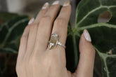 Raw Australian Aquamarine Oxidized Silver Ring shown worn on hand with blue-green crystal and hammered sterling silver band.