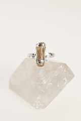Front view of handmade Amber fossil ring showing the honey-gold organic stone and secure sterling silver setting.