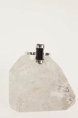 Terminated Black Tourmaline Ring shown on white crystal display with hammered oxidized silver and black crystal setting.