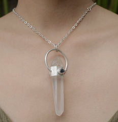 Australian Lemurian Quartz Sapphire Halo Pendant shown worn on the chest with sterling silver chain and sculptural halo design.