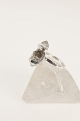 Side view of oxidized sterling silver Tibetan Quartz ring with double terminated crystal and strong handmade silver setting.