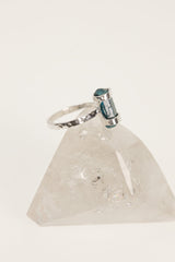 Side view of Blue Apatite crystal ring showing the raised terminated stone, hammered silver band, and handmade setting.