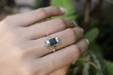 Handmade oxidized 925 sterling silver Blue Apatite ring shown worn on the hand, with a vivid blue terminated crystal.