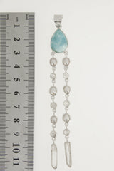 Lightning Ridge Opal Larimar Pearl Moonstone Quartz pendant shown beside a ruler for scale with long vertical crystal layout.