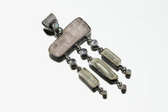 Lightning Ridge Opal Kunzite Moonstone Aquamarine pendant shown on a white background with brushed oxidized silver setting.