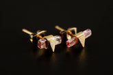 Handmade gold-plated 925 sterling silver Pink Tourmaline triangle stud earrings shown on a dark background, with raw pink crystals.