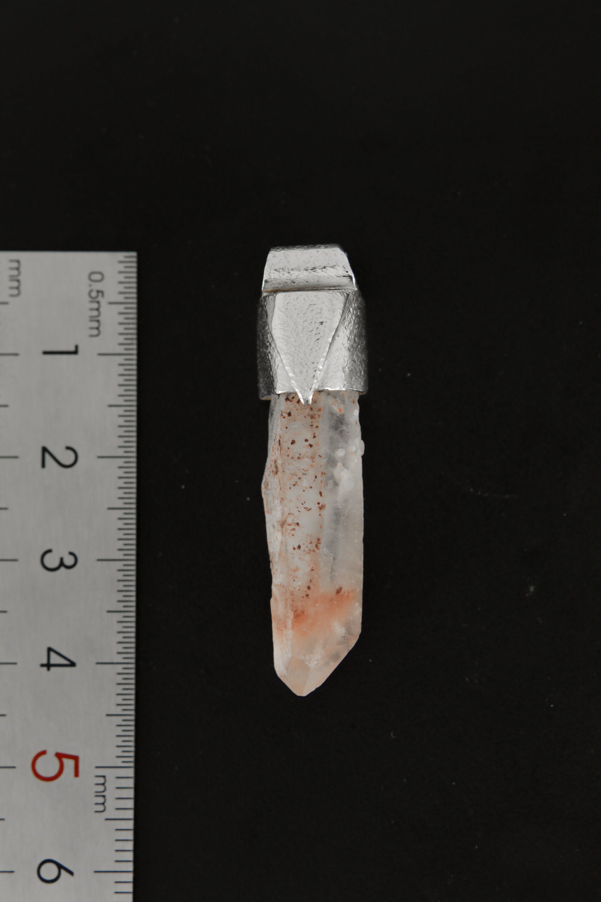 Australian Phantom Lithium Quartz Stack Pendant shown beside a ruler for scale with 925 silver cap and crystal point.