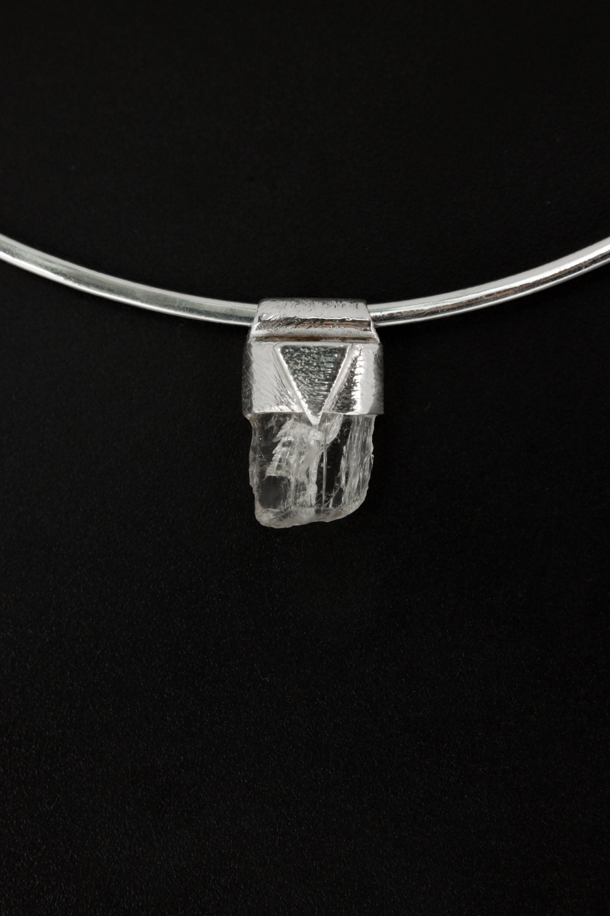 Clear Rainbow Inclusion Spodumene Stack Pendant shown worn close-up as a petite sterling silver layering necklace.