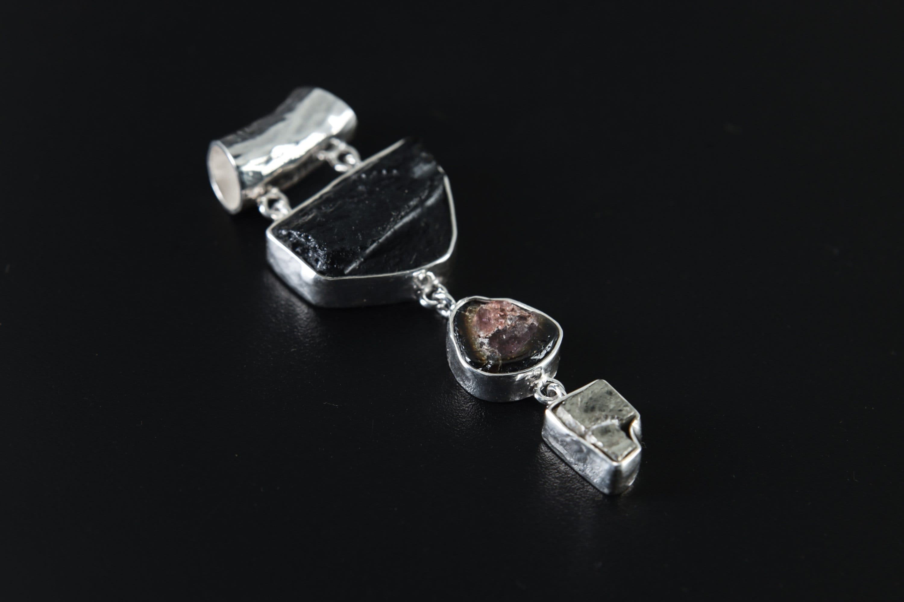 Mount Darwin Tektite Watermelon Tourmaline Pyrite pendant shown on a white background with high-shine 925 sterling silver setting.