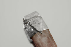 Close-up of Australian Phantom Lithium Quartz with soft lithium-bearing inclusions and handmade sterling silver cap.