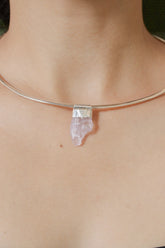Light Pink Kunzite Stack Pendant shown worn on the chest with sterling silver cap and petite pink crystal.