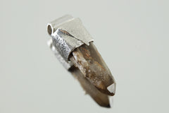 Torrington Citrine Quartz Stack Pendant shown on light background with natural crystal point and textured silver cap.
