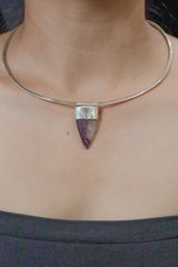 Fang Shaped Charoite Stack Pendant shown worn on the chest as a purple sterling silver layering necklace.