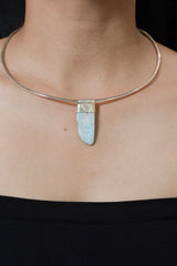 Freeform Larimar Stack Pendant shown worn on the chest as a soft ocean-blue sterling silver layering necklace.