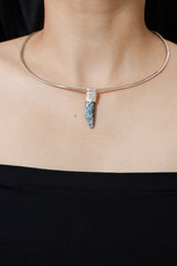 Australian Ocean Kyanite Stack Pendant shown worn on the chest as a subtle sterling silver layering necklace.