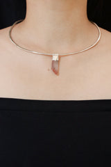Australian Phantom Lithium Quartz Stack Pendant shown worn on the chest with sterling silver cap and soft pink-smoky crystal.