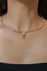 Small Terminated Aquamarine Stack Pendant shown worn on the chest as a subtle sterling silver layering necklace.