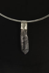 Anhydro Lemurian Vera Cruz Amethyst Stack Pendant shown on black background with silver choker and slender crystal form.