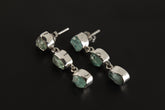 Handmade 925 sterling silver Blue Apatite geometric drop earrings shown on a dark background, with square and triangle gemstone shapes.