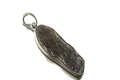 Torrington Smoky Citrine Quartz pendant shown on white background with organic crystal shape and circular bail.