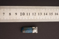 Azurite Stack Pendant shown beside a ruler for scale with 925 silver cap and blue copper mineral stone.