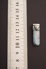 Australian Ocean Kyanite Stack Pendant shown beside a ruler for scale with textured 925 silver cap and polished stone.