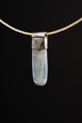 Australian Ocean Kyanite Stack Pendant shown worn on the choker with sterling silver cap and polished blue-green crystal.