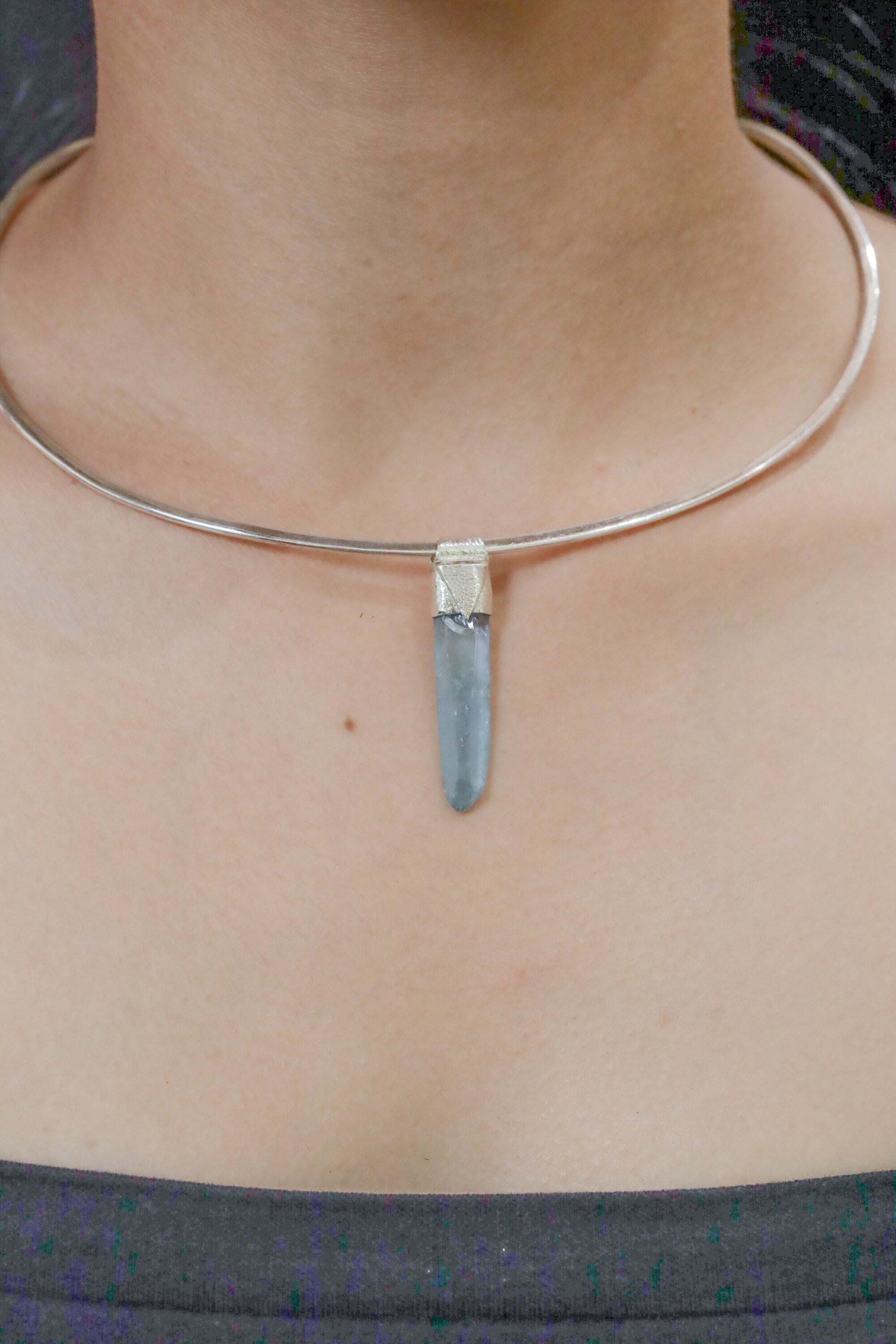 Lemurian Laser Aqua Aura Quartz Stack Pendant shown worn as a luminous blue sterling silver layering necklace.