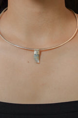 Natural Capped Aquamarine Stack Pendant shown worn on the chest as a subtle sterling silver layering necklace.