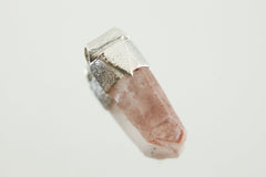 Australian Phantom Lithium Quartz Stack Pendant shown on light background with soft pink phantom crystal and textured silver cap.