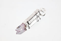 Vera Cruz Amethyst capsule pendant shown on white background with polished 925 sterling silver and raw crystal point.