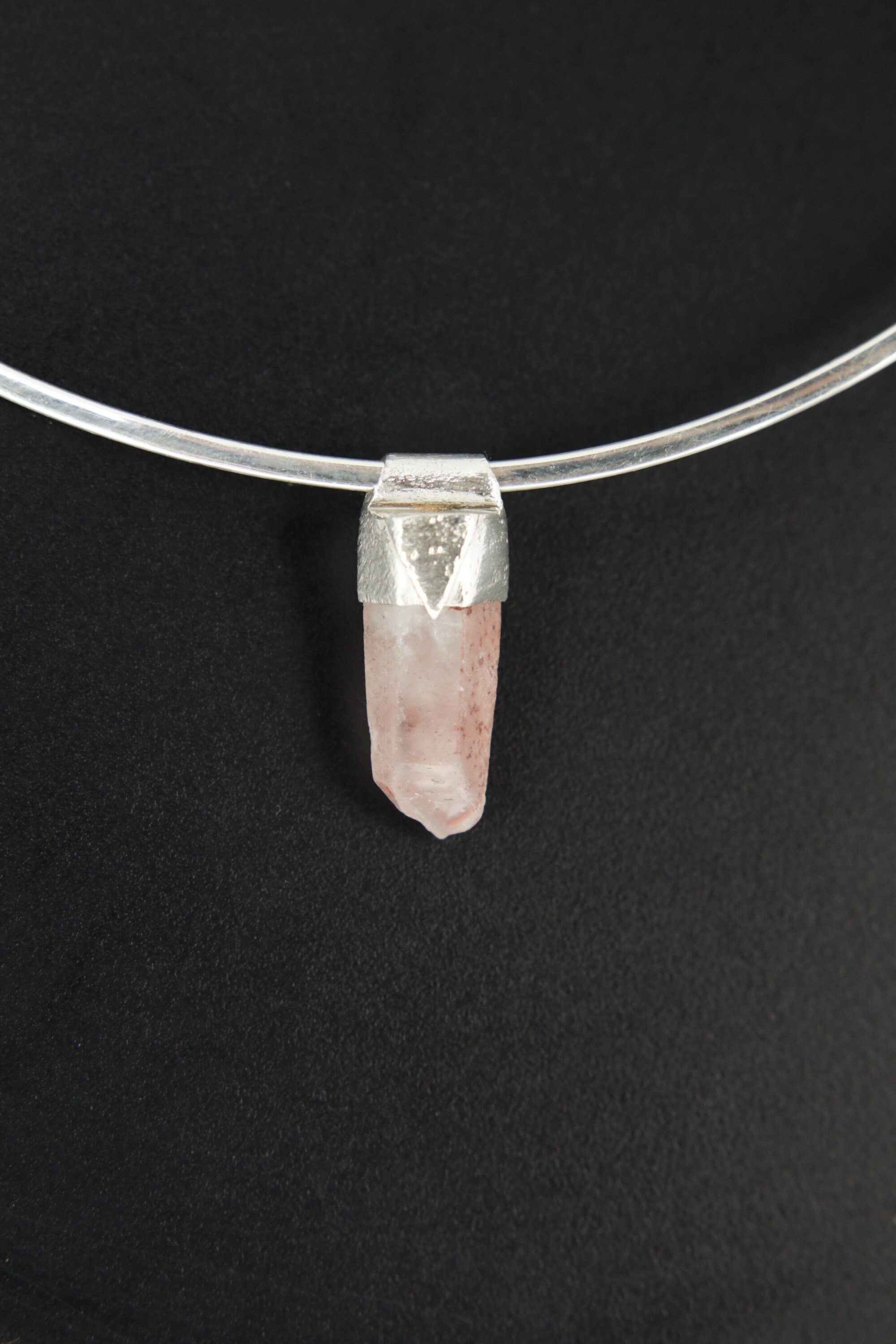 Australian Phantom Lithium Quartz Stack Pendant shown on black background with sterling silver cap and soft pink crystal point.