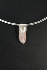 Australian Phantom Lithium Quartz Stack Pendant shown on black background with sterling silver cap and soft pink crystal point.