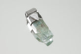 Natural Capped Aquamarine Stack Pendant shown on light background with textured sterling silver cap and soft blue-green crystal.