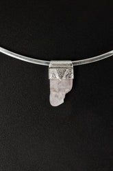 Light Pink Kunzite Stack Pendant shown worn on the chest with sterling silver cap and soft pink crystal.