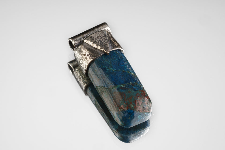 Azurite Stack Pendant shown on light background with textured sterling silver cap and natural blue mineral body.