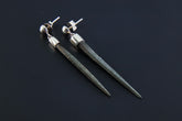Rare Spiky Himalayan Chlorite Quartz earrings shown on dark background, with long raw crystal points and polished silver studs.