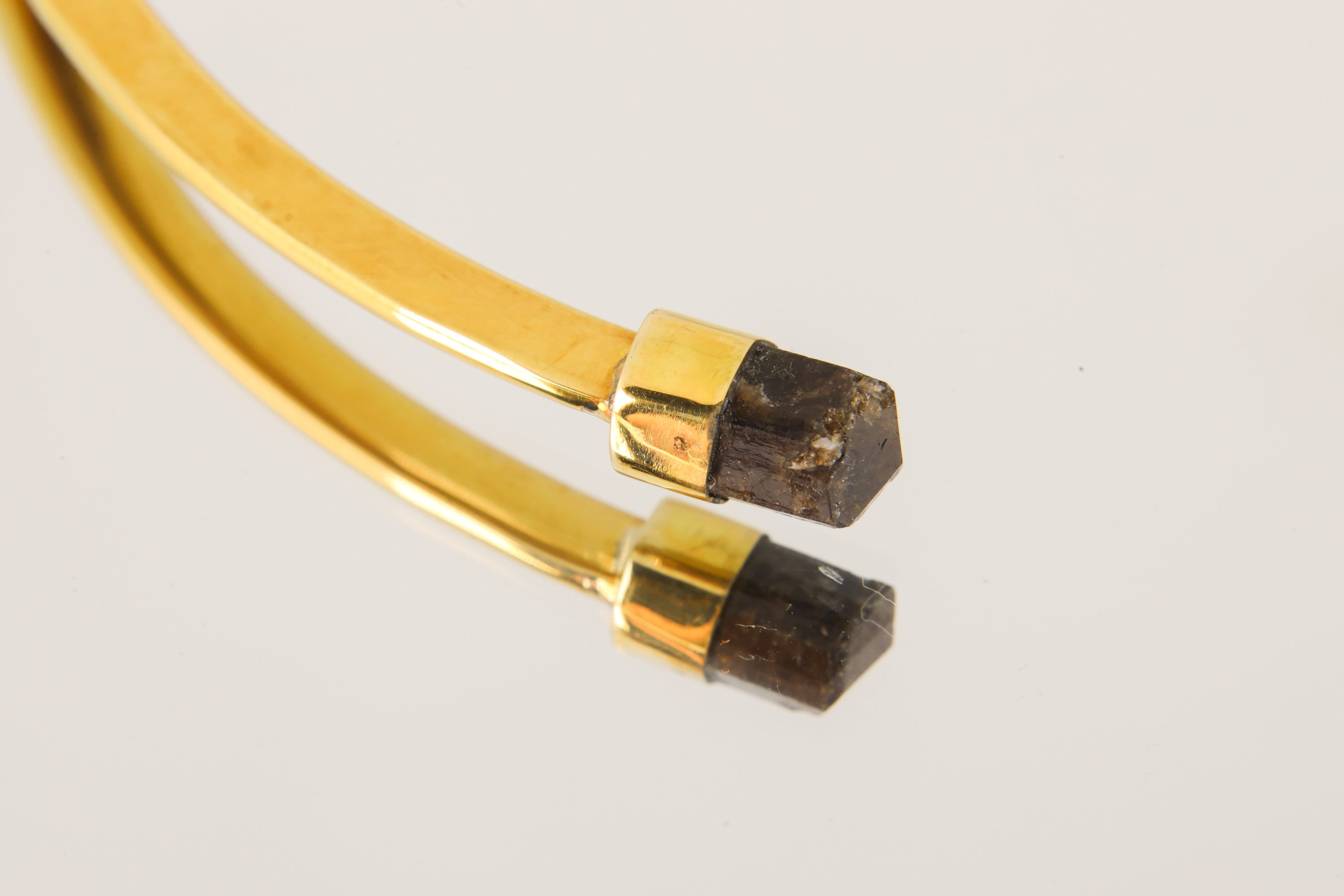Brown Tourmaline Dravite gold-plated brass choker shown worn on the neck, with crystal tips facing inward.