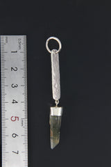 Himalayan Chlorite Quartz sterling silver pendant shown beside a ruler for scale with round bail and hammered silver body.