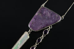 Charoite Angel Aura Quartz Amethyst pendant shown close up, with triangular Charoite and dangling crystal sections.