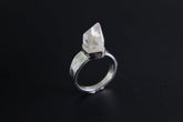 Handmade 925 sterling silver Cacoxenite Quartz point ring shown on a dark background, with clear crystal point and hammered band.
