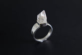 Handmade 925 sterling silver Cacoxenite Quartz point ring shown on a dark background, with clear crystal point and hammered band.