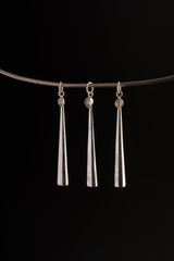 Herkimer Diamond spoon pendant displayed on a choker, showing slim silver ritual scoop styling.