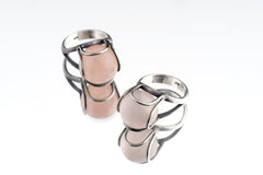 Rose Quartz Floral Silver Ring shown on white background with oxidized sterling silver wire petals and soft pink stone.