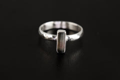 Watermelon Tourmaline ring worn as a delicate sterling silver gemstone ring, shown on model for scale and everyday styling.